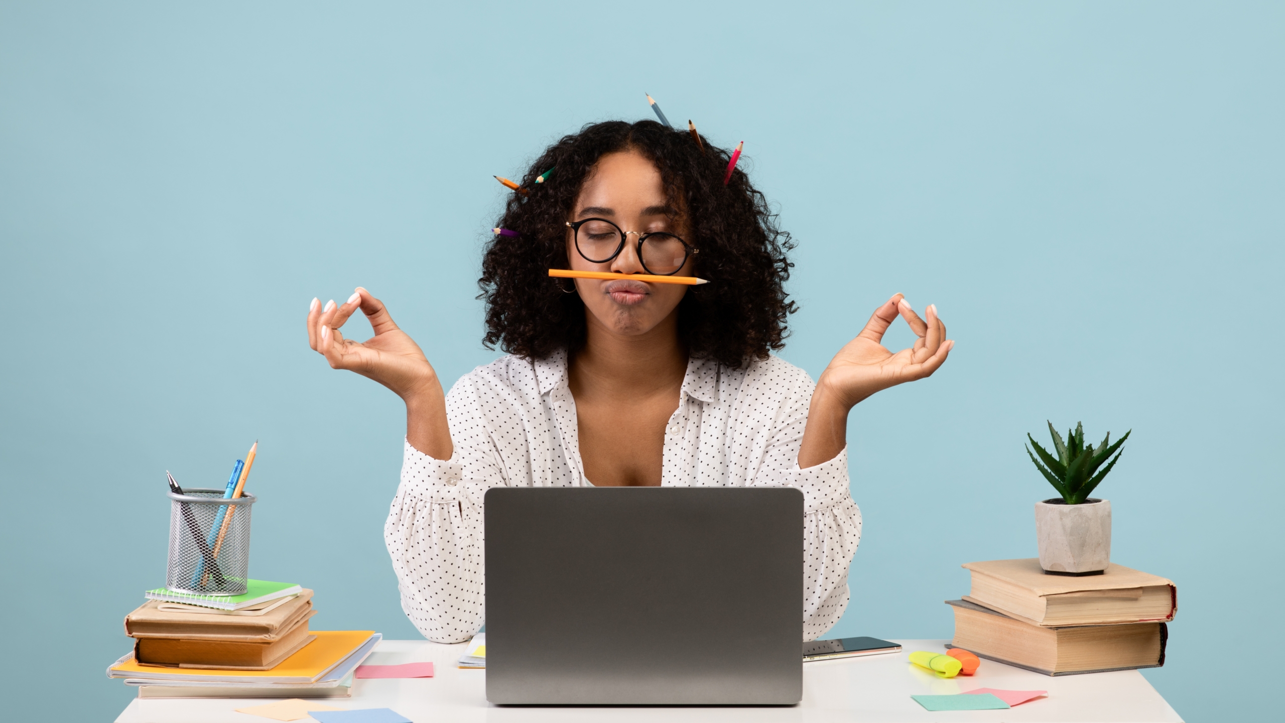 Workplace,Stress,Management.,Silly,Black,Woman,With,Pencils,In,Her
